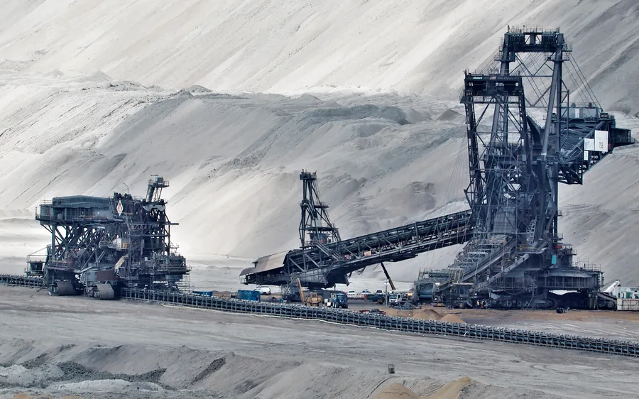 Open-pit mining operation with heavy crushing equipment