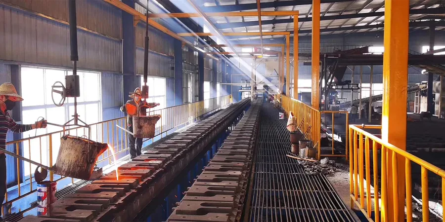 Molten metal pouring in the foundry